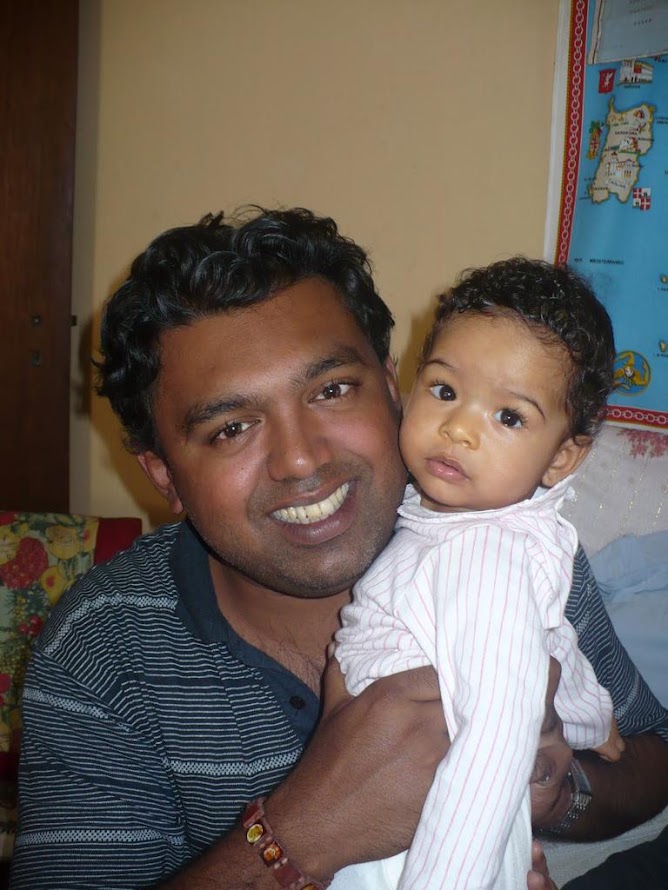 Rekha and Rik with friends at the beach
